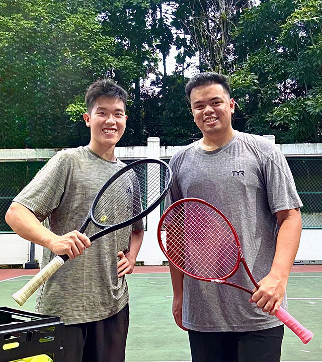 Tennis coach demonstrating forehand technique during lesson